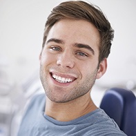 Adult man smiling in dental chair